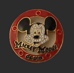 A Mickey Mouse Club Logo Swarovski Pin.