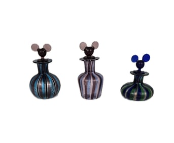 A Set of (3) Vintage Perfume Bottles.