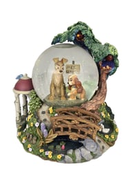 A Large Lady and the Tramp Wet Cement Snow Globe.