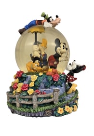 A Rare Mickey Mouse and Friends Snow Globe.