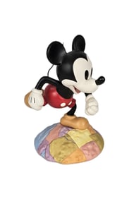 A WDCC Millennium Mickey Figurine With Matching Pin.