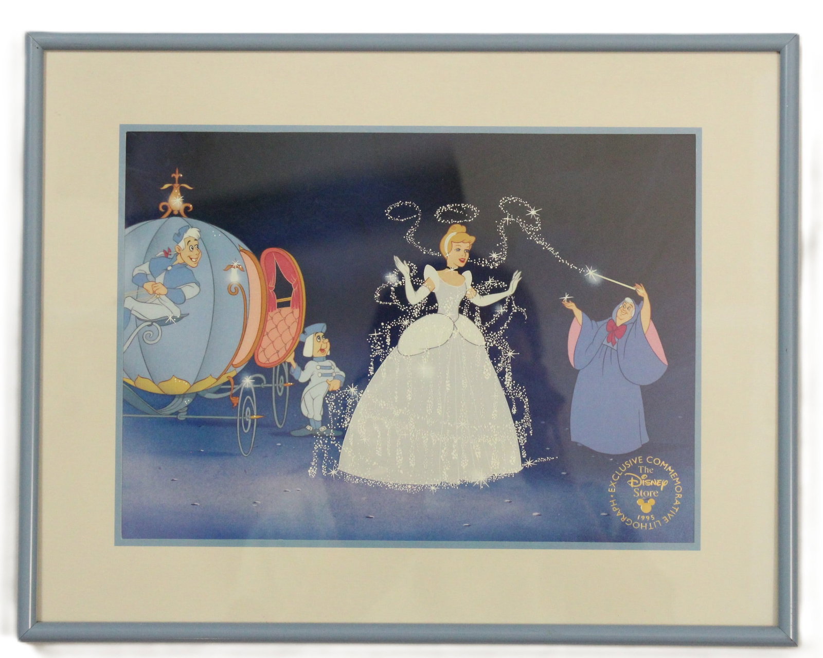 A Cinderella Framed Lithograph.: This Disney Store Exclusive lithograph from 1995 features Cinderella, her Fairy Godmother and two coachmen. This lithograph is framed and matted and measures 14.25" x 11.25".