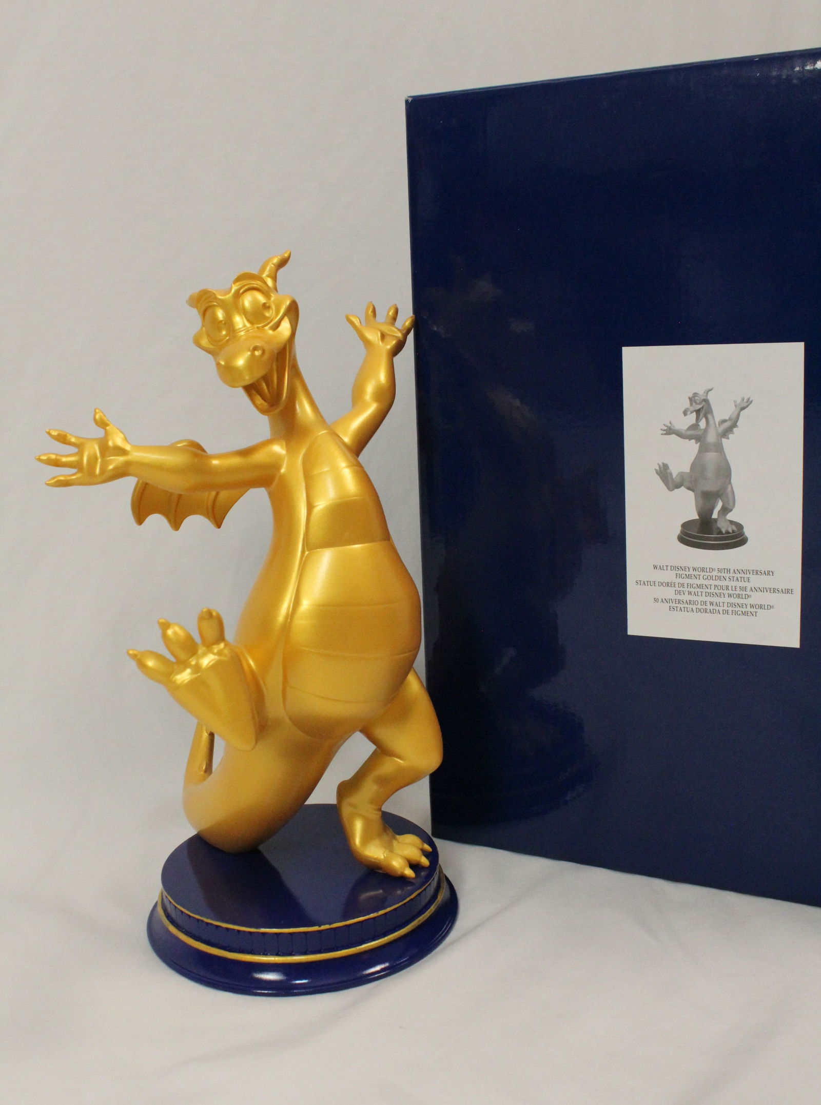 A Walt Disney World 50th Anniversary Figment Golden Statue. (1 of 4)