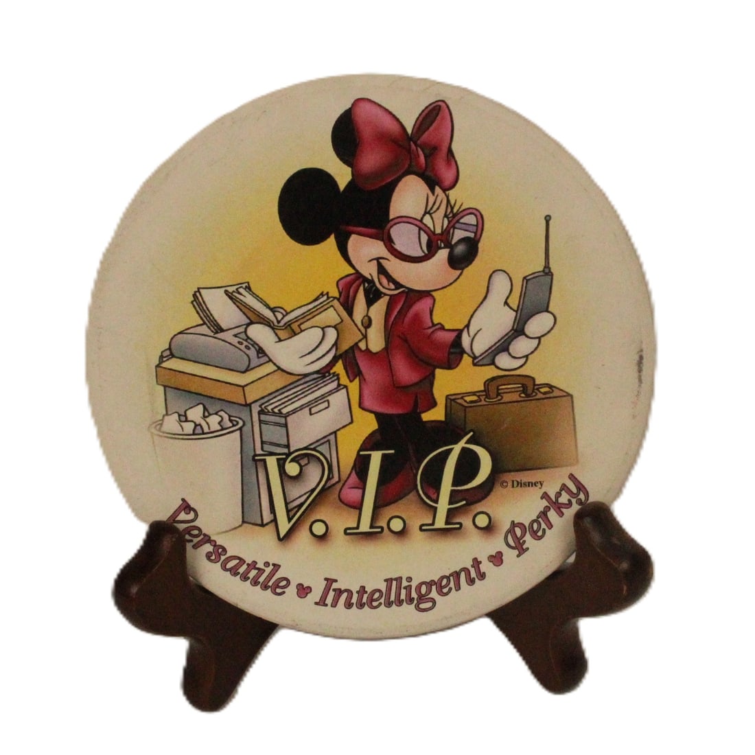 A Pair of Mickey and Minnie Mouse Coasters: A pair of cute Disney drink coasters featuring Mickey and Minnie Mouse Both are in business suits hard at work in an office. Mickey's has the acronymn C.E.O. Defined as Creative, Energetic, and Optimi
