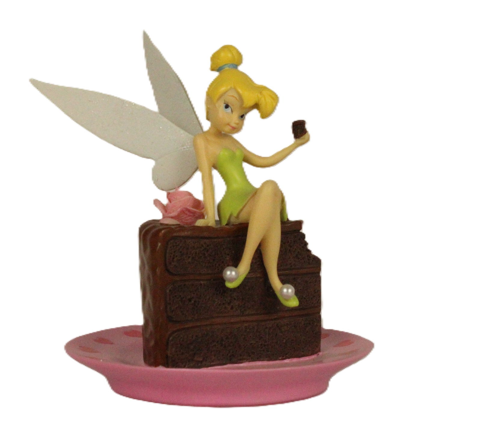 A Tinker Bell “Chocolat-itude?? Figurine.: (Bradford Exchange, early 2000's) This beautiful figurine features Tinker Bell sitting on top of a piece of chocolate cake that resides atop a pink decorative plate. The figure is part of the Hamilton