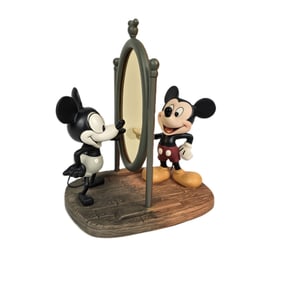 A WDCC Mickey Mouse 75th Anniversary Figurine.