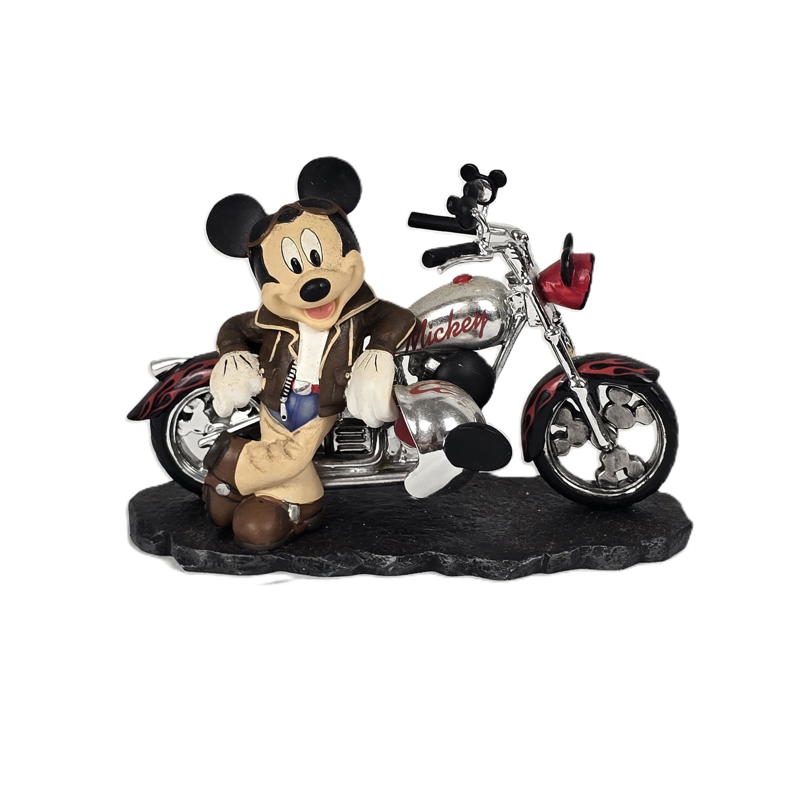 A Mickey Mouse In Front Of A Motorcycle Figurine.: (Hamilton Collection) This is a figure of Mickey Mouse riding a red motorcycle. Titled “Mousin' Around” from the “Mickey and Friends' fun on the Open Road” collection. It was limited t
