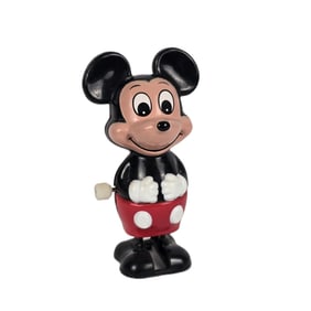 A Vintage Wind-up Walking Mickey Mouse.
