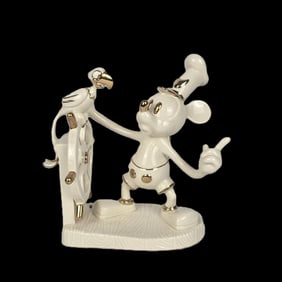 A Lenox Steamboat Willie Figurine.