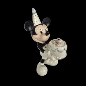 A Lenox Mickey Mouse Birthday Figurine.