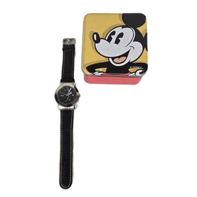 A Disney Parks Silver Profile Watch.