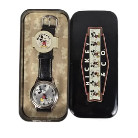 A Silver-toned Mickey and Co Watch.