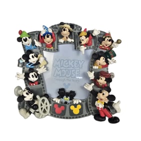 A Mickey Mouse Through The Years Photo Frame.