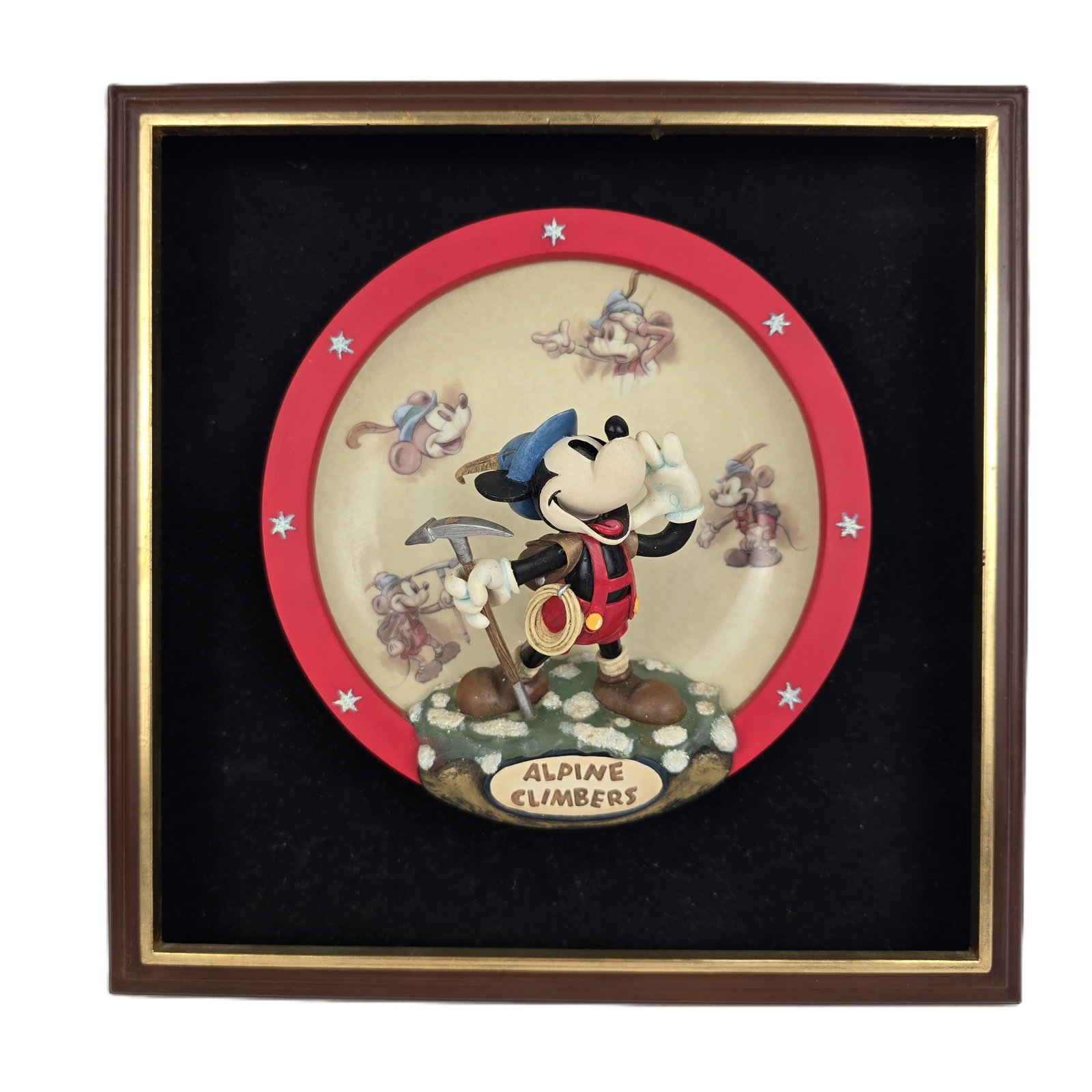 A Limited Edition Mickey Mouse: From the Drawing Board Alpine Mickey 3-D Collector Plate.: (Bradford Exchange, 1998) This is a excellent collector plate series, Mickey Mouse: From the Drawing Board, from the Bradford Exchange with the title”Alpine Mickey”. It features a red bord