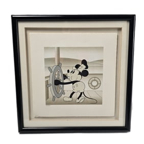 A Limited Edition Framed Steamboat Willie Print.