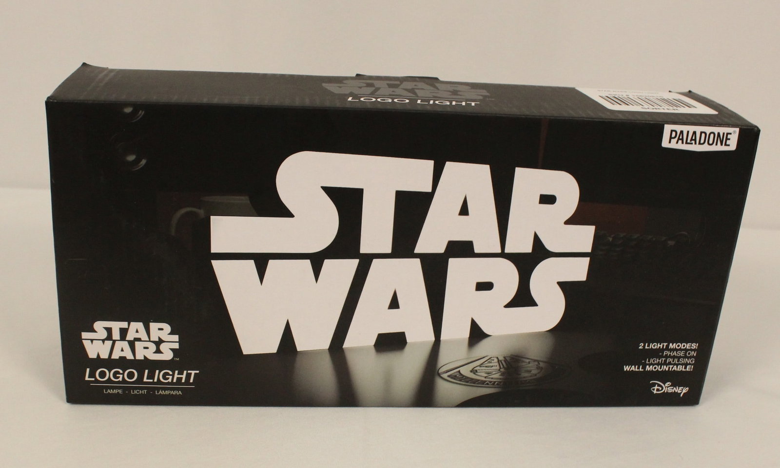 A Light-up Star Wars Logo Sign.: (Paladone) This is an officially licensed Star Wars Logo Light. It has two light modes and is wall mountable. It is new in box.