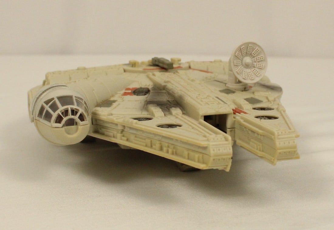 A MicroMachines Star Wars Action Fleet Millenium Falcon Toy. (1 of 7)