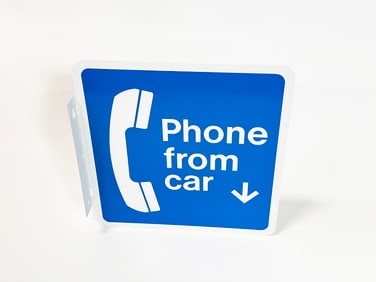 NOS 1970s Bell Telephone "Phone From Car" double-sided tin flange sign.