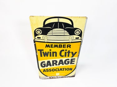 Scarce 1950s Twin City Garage Association single-sided tin sign.