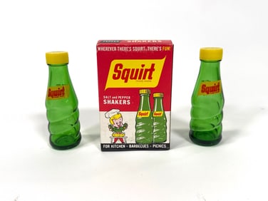 NOS set of 1960s Squirt Soda glass bottle shaped salt and pepper shakers.