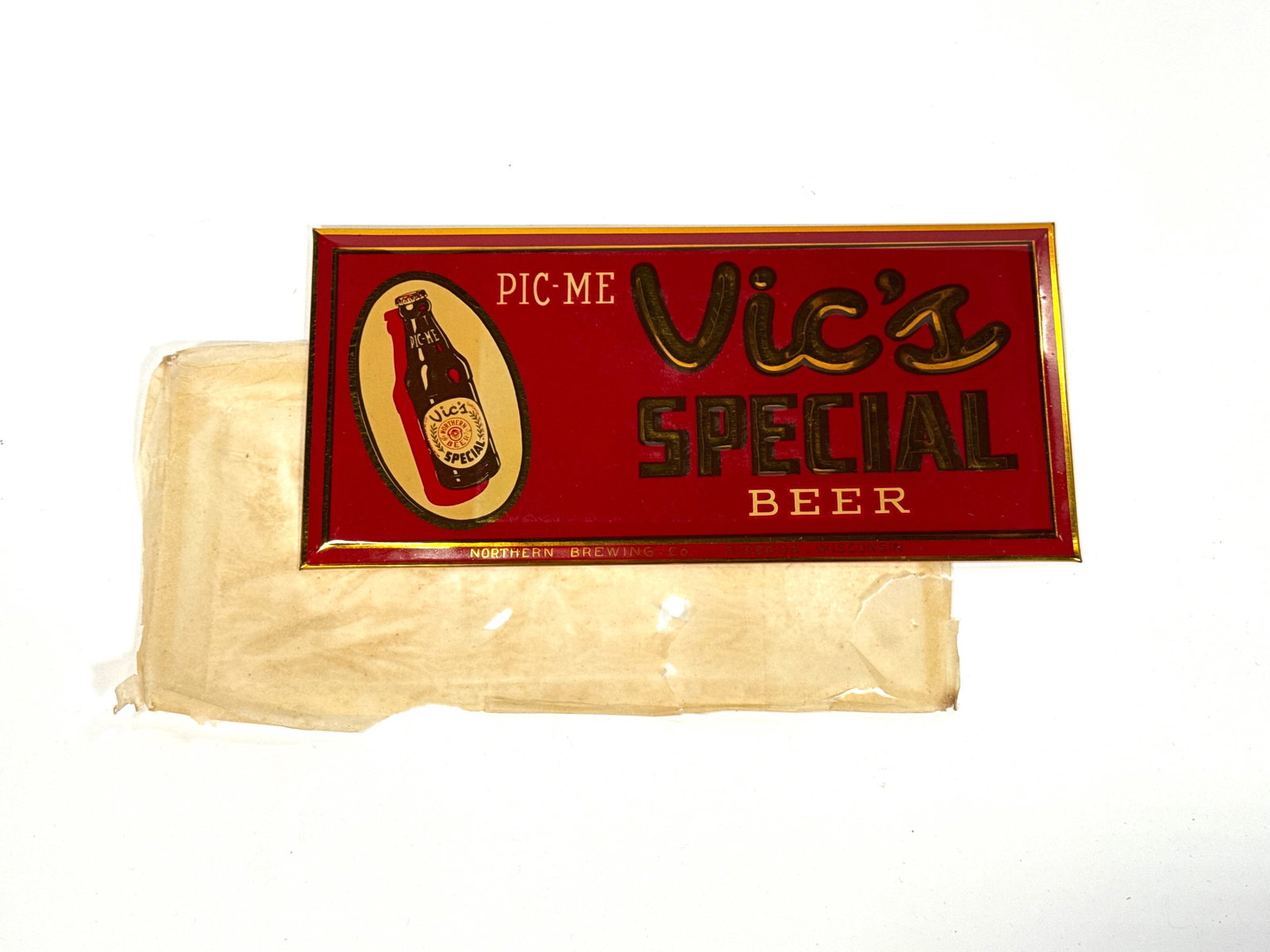 Late 1930s NOS Vic’s Special Beer celluloid sign. (1 of 1)