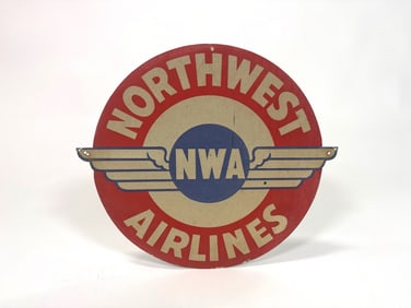Scarce late 1950s North West Airlines single sided die cut tin sign.