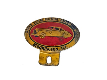 Circa 1938 State Farm automobile insurance pectin sign.