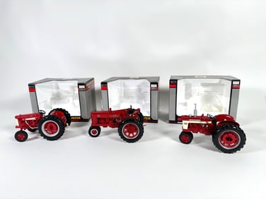 Lot of three Classic Series Farmall International Harvester Tractors by SpecCast with boxes
