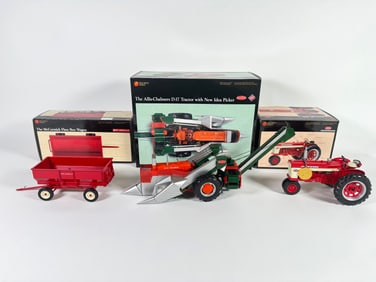 Lot of three Precision Series McCormick and Allis Chalmers Tractors/Wagon by Ertl with boxes