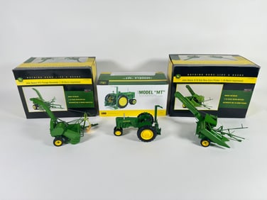 Lot of three John Deere tractor and attachments by SpecCast with boxes