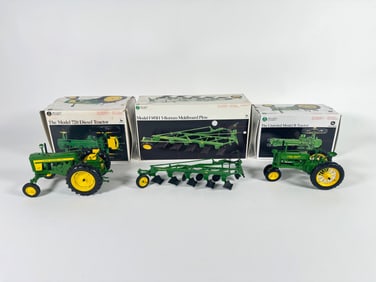 Lot of three Precision Classics John Deere Tractors and Accessory by Ertl with boxes