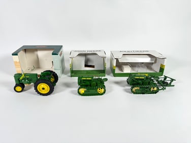 Lot of three John Deere crawlers and tractor by SpecCast with boxes