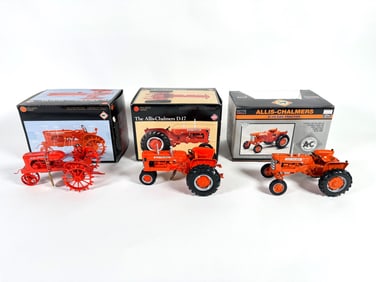 Lot of three Allis-Chalmers tractors by Ertl and SpecCast with boxes