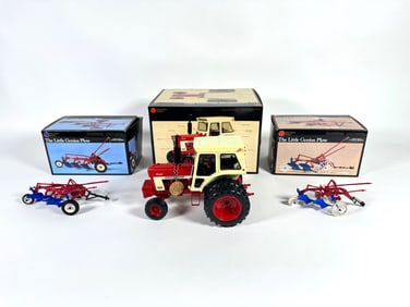 Lot of three Precision Series plows and tractor by Ertl with boxes