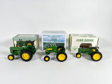 Lot of three John Deere tractors by Ertl and Scale Models with boxes