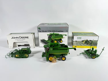 Lot of three John Deere die-cast tractors and accessories by SpecCast and Ertl with boxes