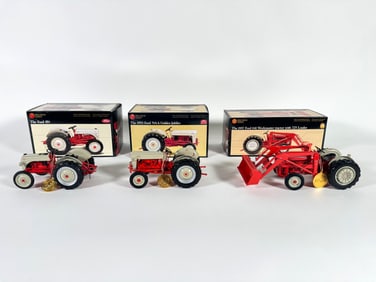 Lot of three Ford Precision Series tractors by Ertl with boxes