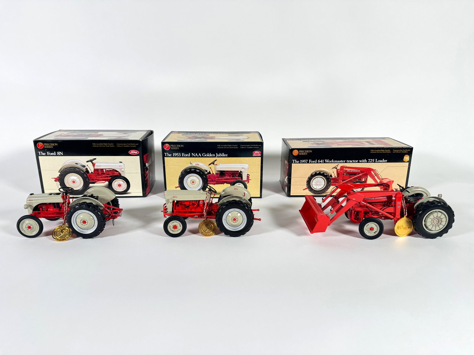 Lot of three Ford Precision Series tractors by Ertl with boxes (1 of 2)