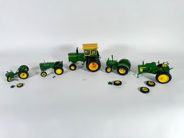 Lot of five John Deere tractors by SpecCast and Ertl