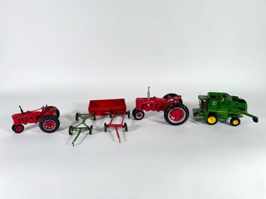 Lot of five tractors,wagon and rotary combine harvester by John Deere, McCormick Farmall and Tru