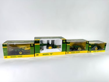 Lot of four John Deere tractors and towable accessories by SpecCast in boxes