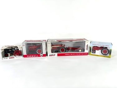 Lot of four McCormick Deering Farmall and McCormick Farmall tractors by Ertl in box