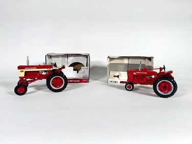 Lot of two McCormick Farmall tractors by Ertl in boxes