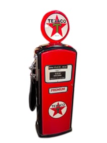 Nicely restored 1950s Texaco Oil Bennett service station gas pump.