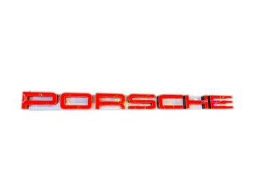 Large Porsche Automobiles single-sided channel-letter light-up dealership sign.