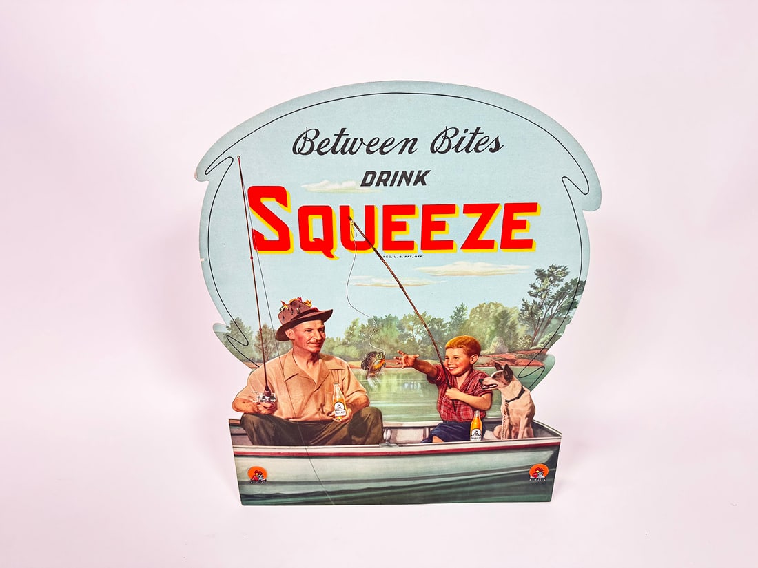 NOS late 1940s Squeeze Orange Soda single-sided die-cut cardboard easel-backed sign. (1 of 2)
