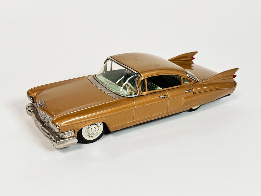1959 Cadillac 4-dour sedan tin litho friction drive car by Bandai of Japan. (1 of 2)