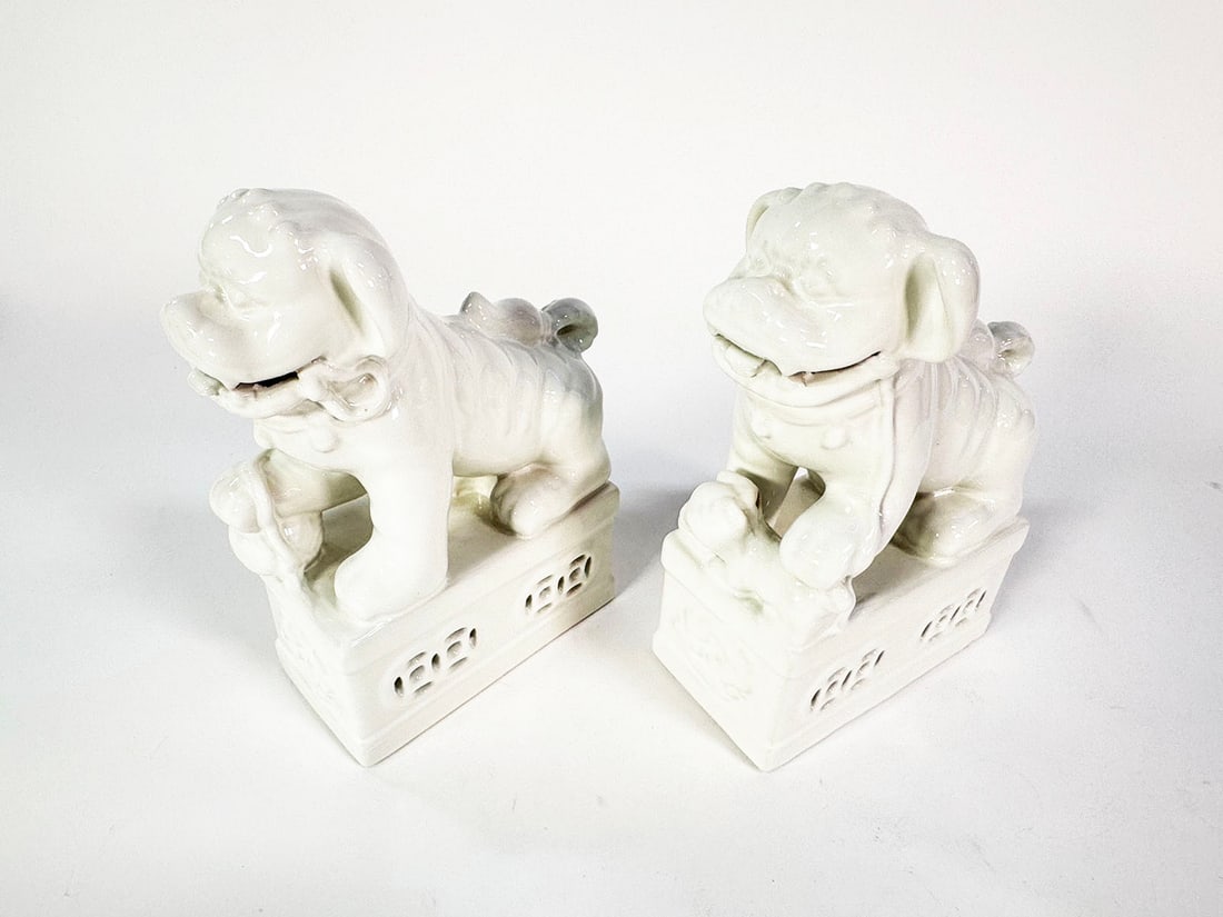 Pair of white porcelain Foo Dogs/ guardian lions.: Pair of white porcelain Foo Dogs/ guardian lions. Great condition. 3.5"x10"x7"