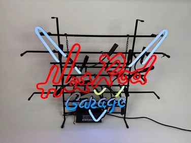 Hot Rod Garage neon sign in metal skeleton frame.