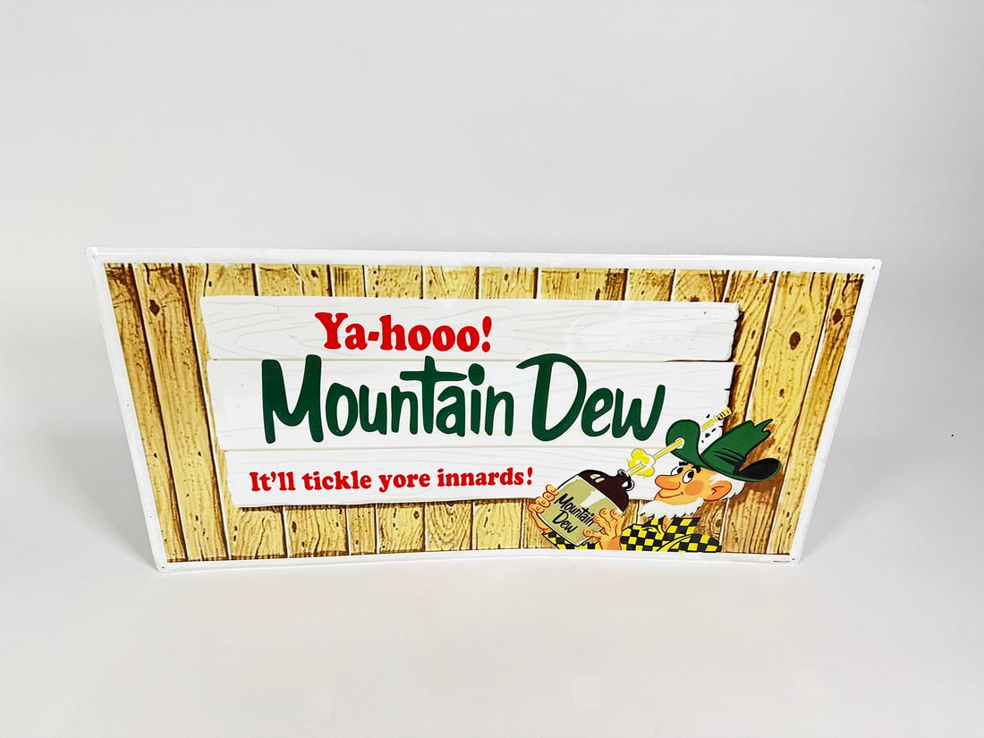 Reproduction Mountain Dew single-sided embossed tin sign. (1 of 2)